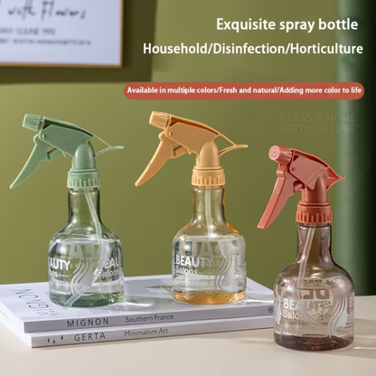 A handheld spray bottle with an ergonomic grip and precision nozzle.